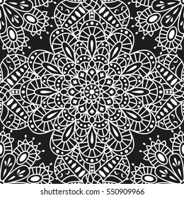 Seamless ethnic pattern with mandala. Arabic floral background. Golden and black colors. Detailed vector illustration. 