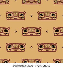 
Nahtloses ethnisches Muster mit den Native American Tlingit Masken des Totembären. 