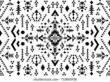 Seamless Ethnic pattern textures. Abstract Navajo geometric print. Rustic decorative ornament. Native American pattern. Black & white colors.