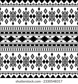 Seamless ethnic pattern with traditional tribal texture design for fabric print. Geometric abstract vector illustration Aztec and Navajo style. Black and white colors.