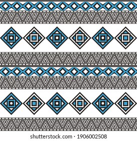 Seamless ethnic pattern with triangles, rhombuses, circles.