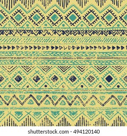 Seamless ethnic pattern. Tribal ornament. Striped geometric background drawing by hand. Vector illustration.