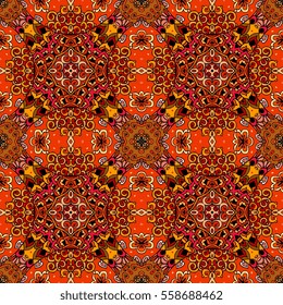 Seamless ethnic pattern in warm tones with red flowers on abstract geometric background. Vector illustration. Print for fabric, wrapping design, greeting card.
