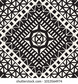 Seamless ethnic and tribal pattern. Hand drawn ornamental stripes. Black and white print for your textiles. Vector geometric background.