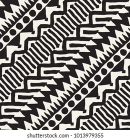 Seamless ethnic and tribal pattern. Hand drawn ornamental stripes. Black and white print for your textiles. Vector geometric background.