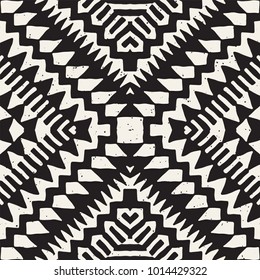 Seamless ethnic and tribal pattern. Hand drawn ornamental stripes. Black and white print for your textiles. Vector geometric background.