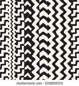 Seamless ethnic and tribal pattern. Hand drawn ornamental stripes. Black and white print for your textiles. Vector geometric background.