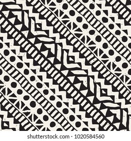 Seamless ethnic and tribal pattern. Hand drawn ornamental stripes. Black and white print for your textiles. Vector geometric background.