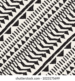 Seamless ethnic and tribal pattern. Hand drawn ornamental stripes. Black and white print for your textiles. Vector geometric background.