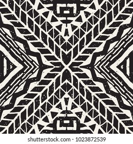 Seamless ethnic and tribal pattern. Hand drawn ornamental stripes. Black and white print for your textiles. Vector geometric background.