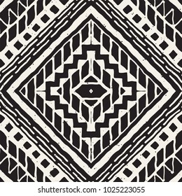 Seamless ethnic and tribal pattern. Hand drawn ornamental stripes. Black and white print for your textiles. Vector geometric background.