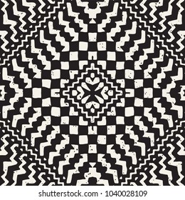 Seamless ethnic and tribal pattern. Hand drawn ornamental stripes. Black and white print for your textiles. Vector background.
