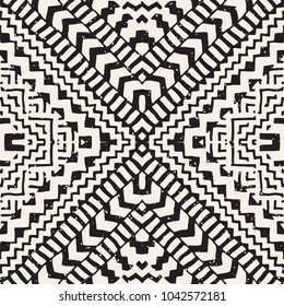 Seamless ethnic and tribal pattern. Hand drawn ornamental stripes. Black and white print for your textiles. Vector geometric background.