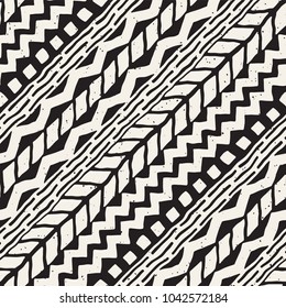 Seamless ethnic and tribal pattern. Hand drawn ornamental stripes. Black and white print for your textiles. Vector geometric background.