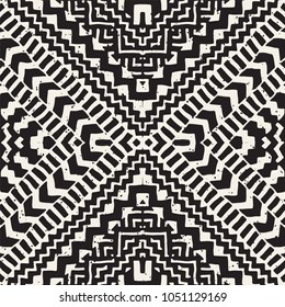 Seamless ethnic and tribal pattern. Hand drawn ornamental stripes. Black and white print for your textiles. Vector geometric background.