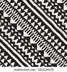 Seamless ethnic and tribal pattern. Hand drawn ornamental stripes. Black and white print for your textiles. Vector geometric background.