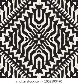 Seamless ethnic and tribal pattern. Hand drawn ornamental stripes. Black and white print for your textiles. Vector geometric background.