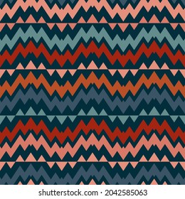 Seamless ethnic tribal pattern. Traditional illustration with colorful zigzag shapes. Vector background is used as a design for cover, packaging, plaid, textiles, wallpaper, carpet