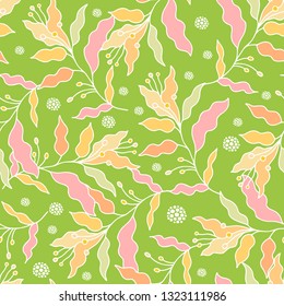 Seamless ethnic vector floral pattern with colorful stylized flowers on green background 