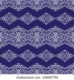 Seamless ethnic white patterns on blue background for border. Repeated oriental motif for fabric or paper design.