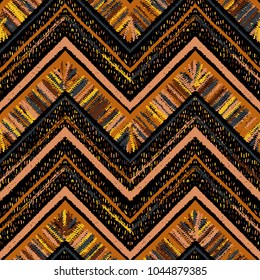 Seamless ethnic zigzag chevron pattern. Hand drawn colorful geometric background. Striped tribal motifs. Vector illustration