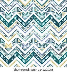 Seamless ethnic zigzag chevron pattern. Hand drawn colorful geometric background. Striped tribal motifs. Vector illustration