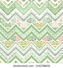 Seamless ethnic zigzag chevron pattern. Hand drawn colorful geometric background. Striped tribal motifs. Vector illustration