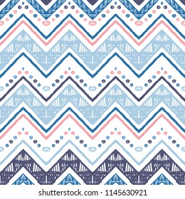 Seamless ethnic zigzag chevron pattern. Hand drawn colorful geometric background. Striped tribal motifs. Vector illustration