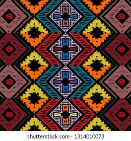 Seamless ethnic zigzag chevron pattern. Hand drawn colorful geometric background. Striped tribal motifs. Vector illustration