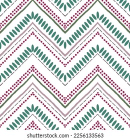 Seamless ethnic zigzag chevron pattern. Hand drawn colorful geometric green background. Striped tribal motifs. Vector illustration