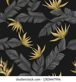 Seamless exotic composition from gray tropical banana leaves and gold flowers bird of paradise on the black background