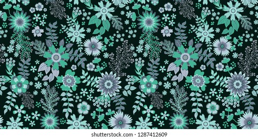 Seamless exotic floral pattern with bright colorful flowers and tropic leaves on a dark blue background. The elegant the template for fashion prints. Modern floral background. Trendy Folk style