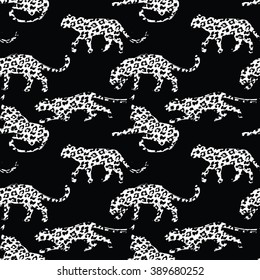 Seamless exotic pattern with abstract silhouettes of animals. Vector hand draw illustration.