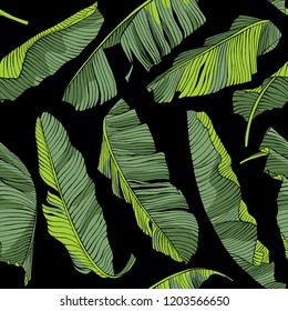 Seamless exotic pattern. Green Tropical banana leaves on a black background. Textile composition, hand drawn style print. Vector illustration.