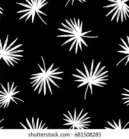 Seamless exotic pattern with silhouette of tropical palm leaves. Vector hand drawn background. Black and white.