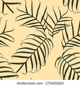 Seamless exotic pattern with tropical leaves on a vintage yellow background. 