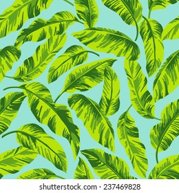 Seamless exotic pattern with tropical leaves on a blue background. Vector illustration. 