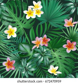 Seamless exotic pattern with tropical leaves and flowers on a dark background background. Realistic tropical plants seamless pattern. Vector illustration. 