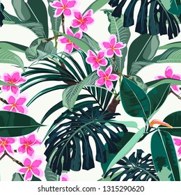Seamless exotic pattern with tropical monstera palm leaves with bright pink plumeria flowers branch on a light background. 