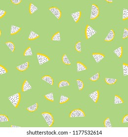 Seamless exotic pattern of yellow dragon fruit on colored background