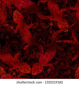 Seamless exotic tropical vector pattern with gecko lizards in shades of red on the background of the mandala
