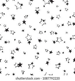 Seamless fairytale pattern with calligraphic and shabby stars on white background. Vector illustration. Magic fireworks. Star line pattern.