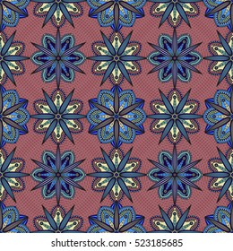 Seamless fantastic floral pattern in pinkish amaranth purple, blue, green & ivory yellow. 