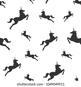 seamless fantasy pattern with   silhouette of unicorns. vector flat Magic creative ornament on white background