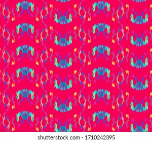 Seamless fashion ikat pattern. Ethnic motif.  Beautiful ornate background. 