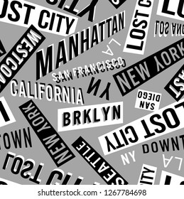 Seamless fashion print with city names, white, grey and black