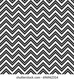 Seamless fashion zigzag pattern. Zigzag lines. Chevron pattern. Herringbone pattern. Vector monochrome background.