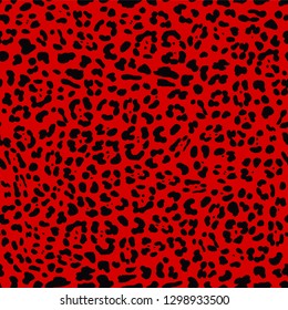 Seamless Faux Textured Jaguar/Leopard print seamless pattern with black spots on bright red background. Vector EPS10 animal repeat surface pattern. Punk rock 80s style fashion pattern.