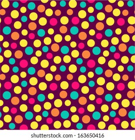 Seamless festive background with colored dots