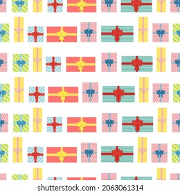 Seamless festive pattern with Christmas gifts. Christmas pattern for wrapping paper and backgrounds. Vector image.